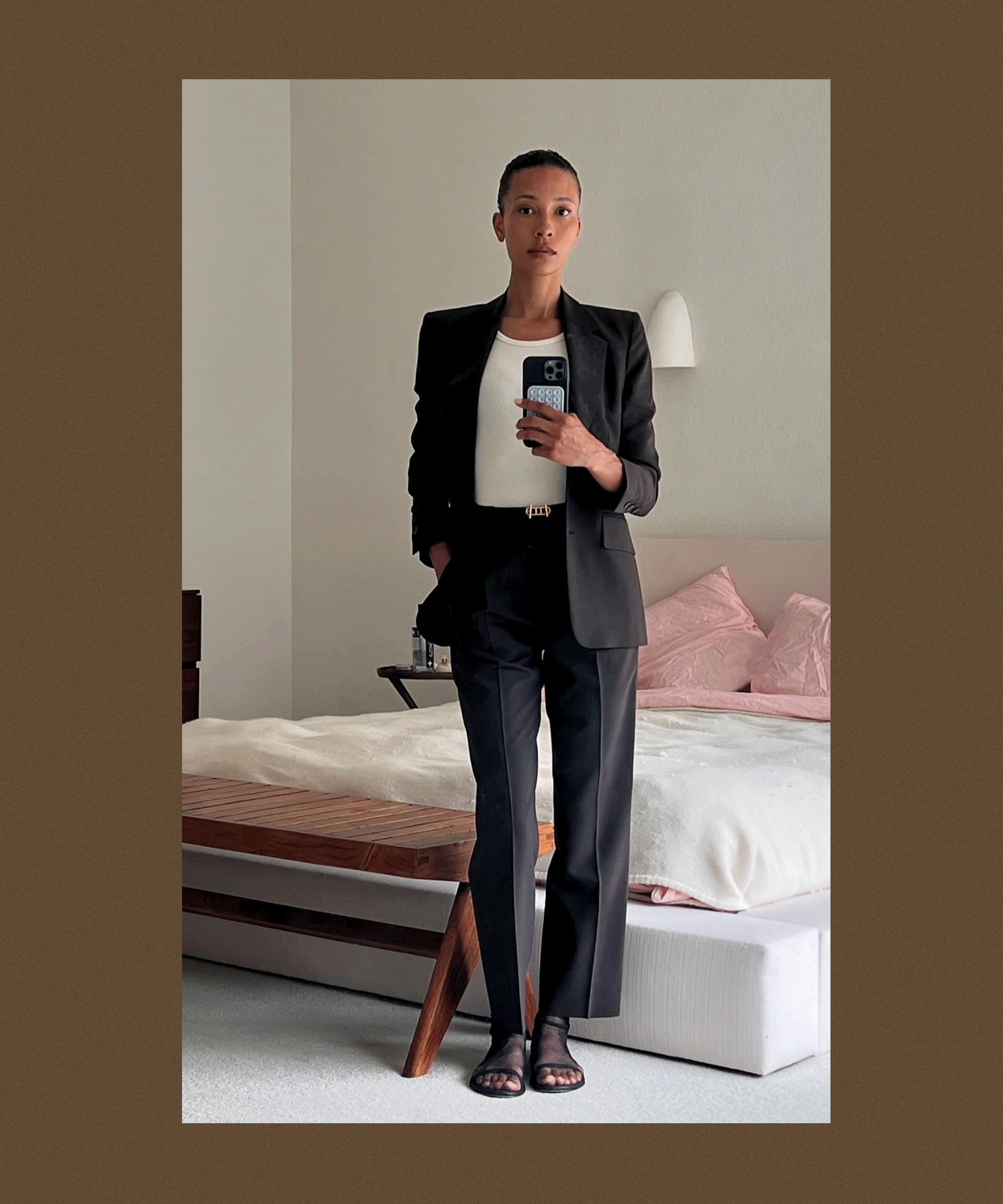 A brown backdrop with flashing images of influencers styling sheer tights during the spring time, a trend from the S/S 25 runways.