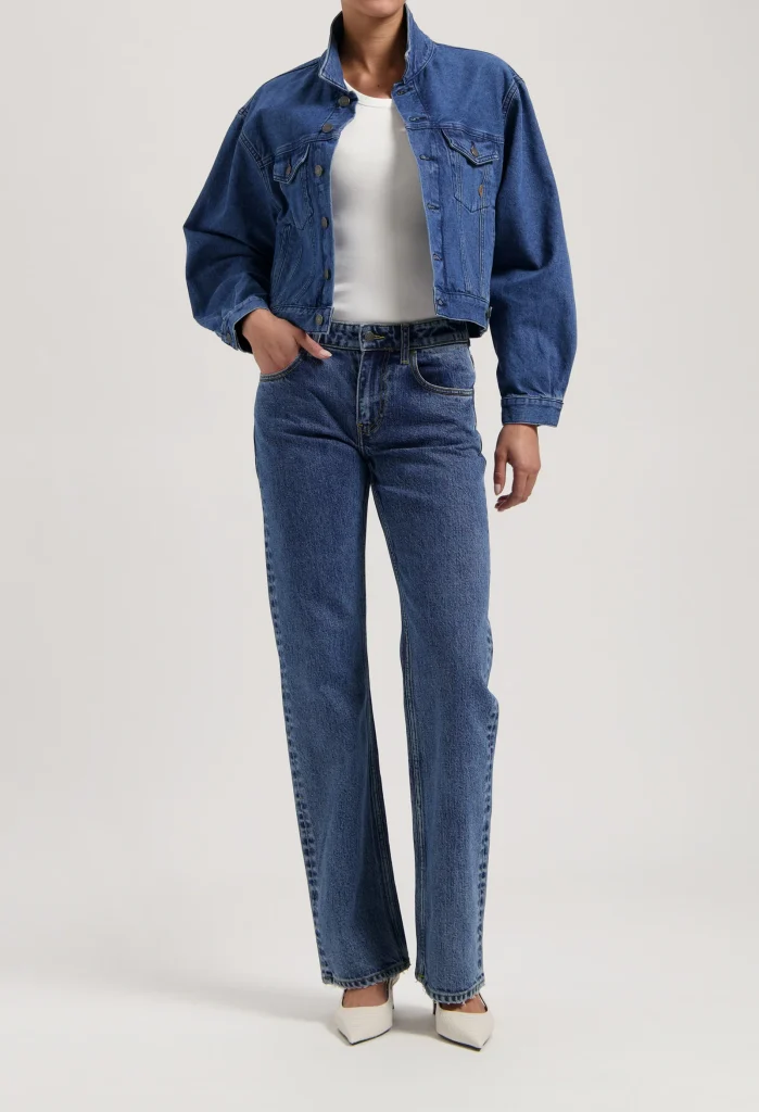 a woman wearing sustainable denim from mud jeans