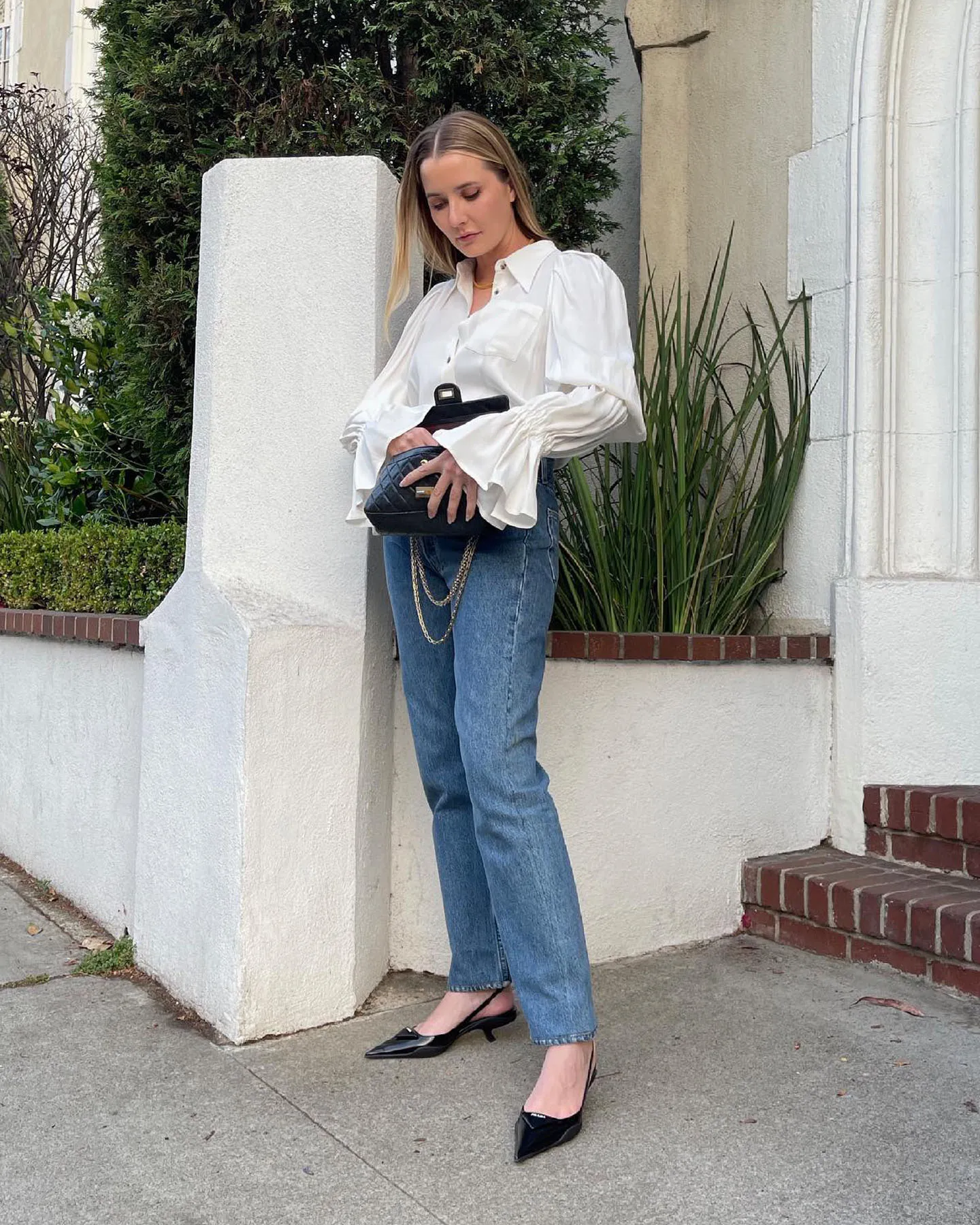 fashion influencer wearing black slingback heels
