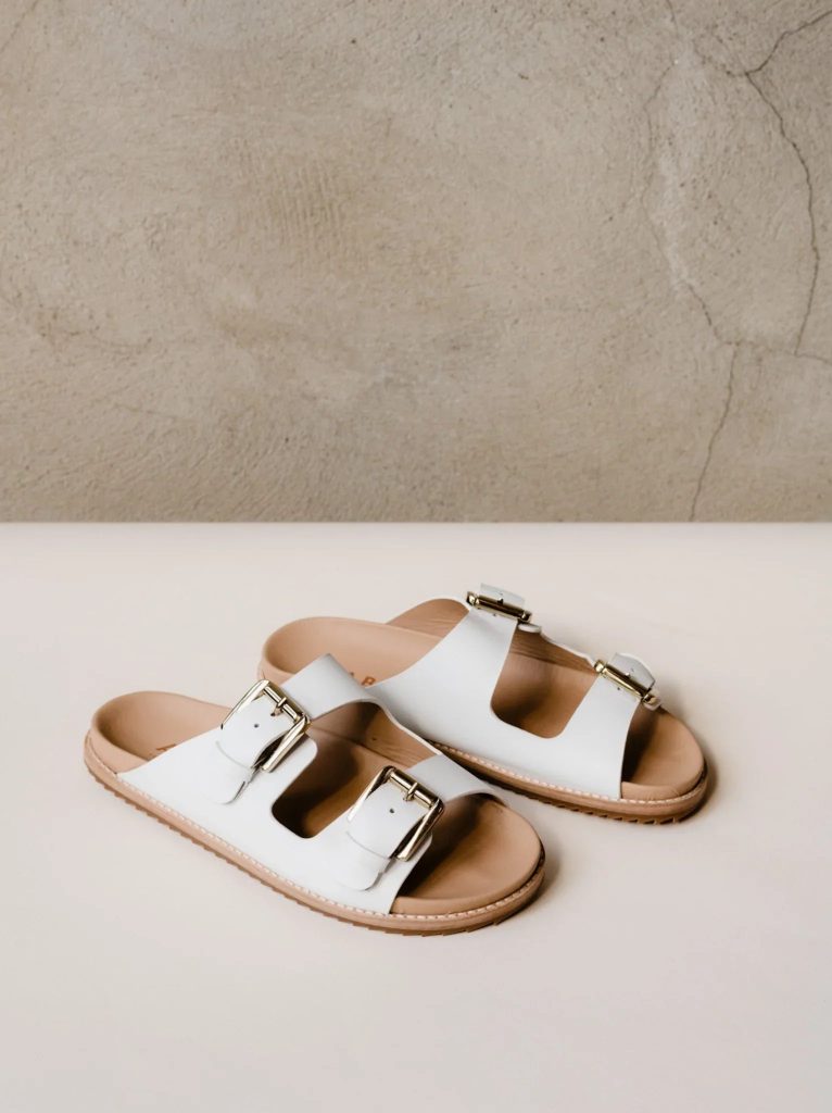 A pair of white sandals from ethical brand ABLE for a sustainable alternative to Birkenstock