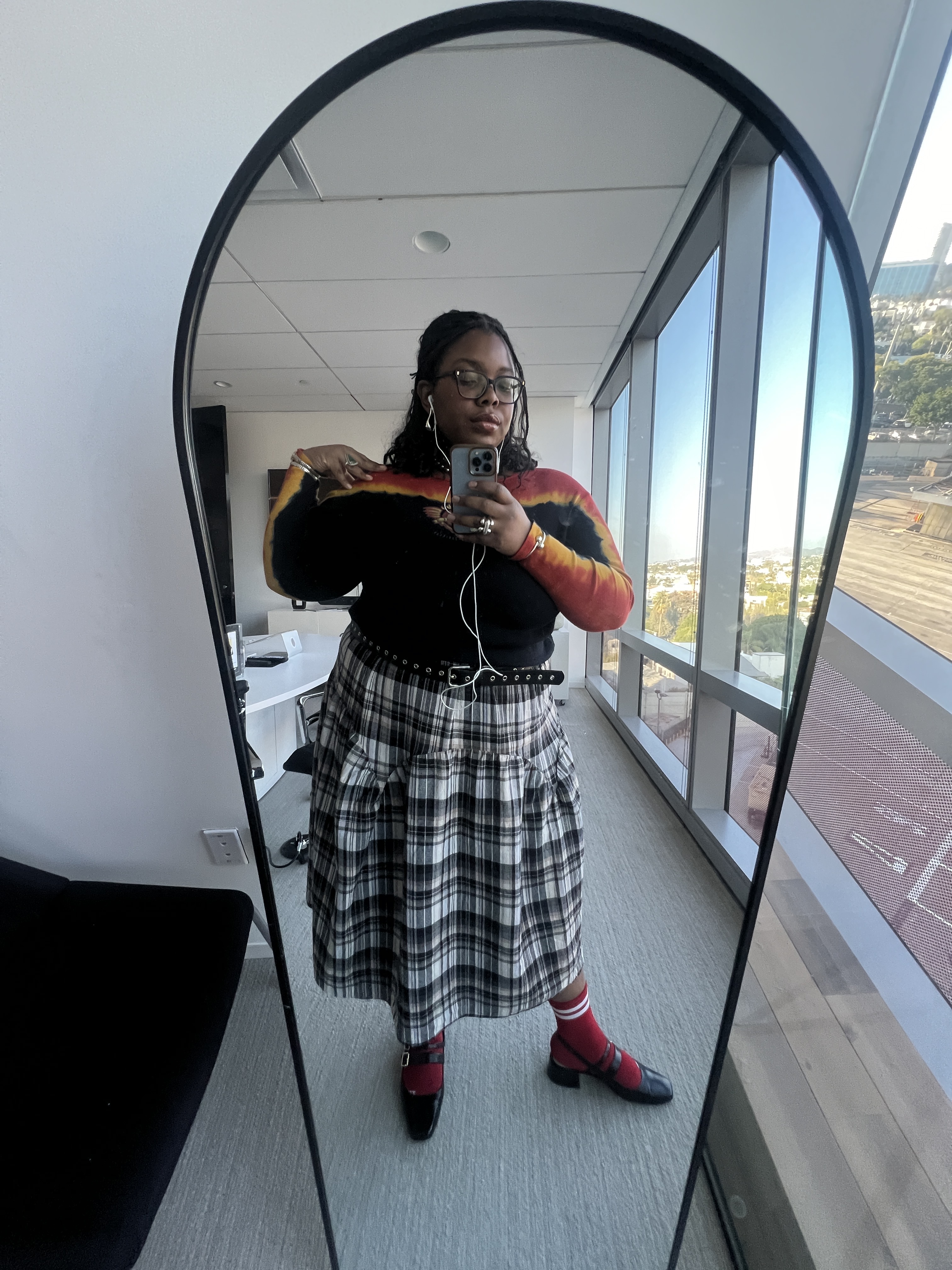 Chinazor Offor wearing Dolce Vita black slingback heels