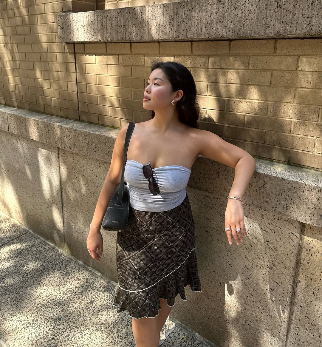 woman wearing tube top and midi skirt