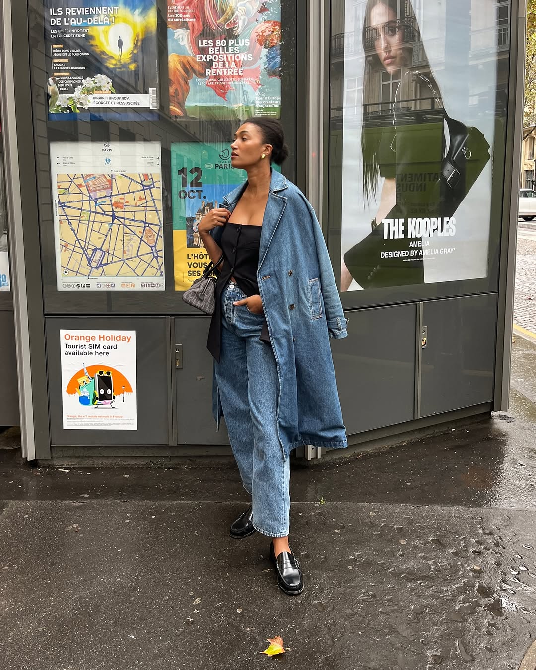 woman wearing black tube top and denim