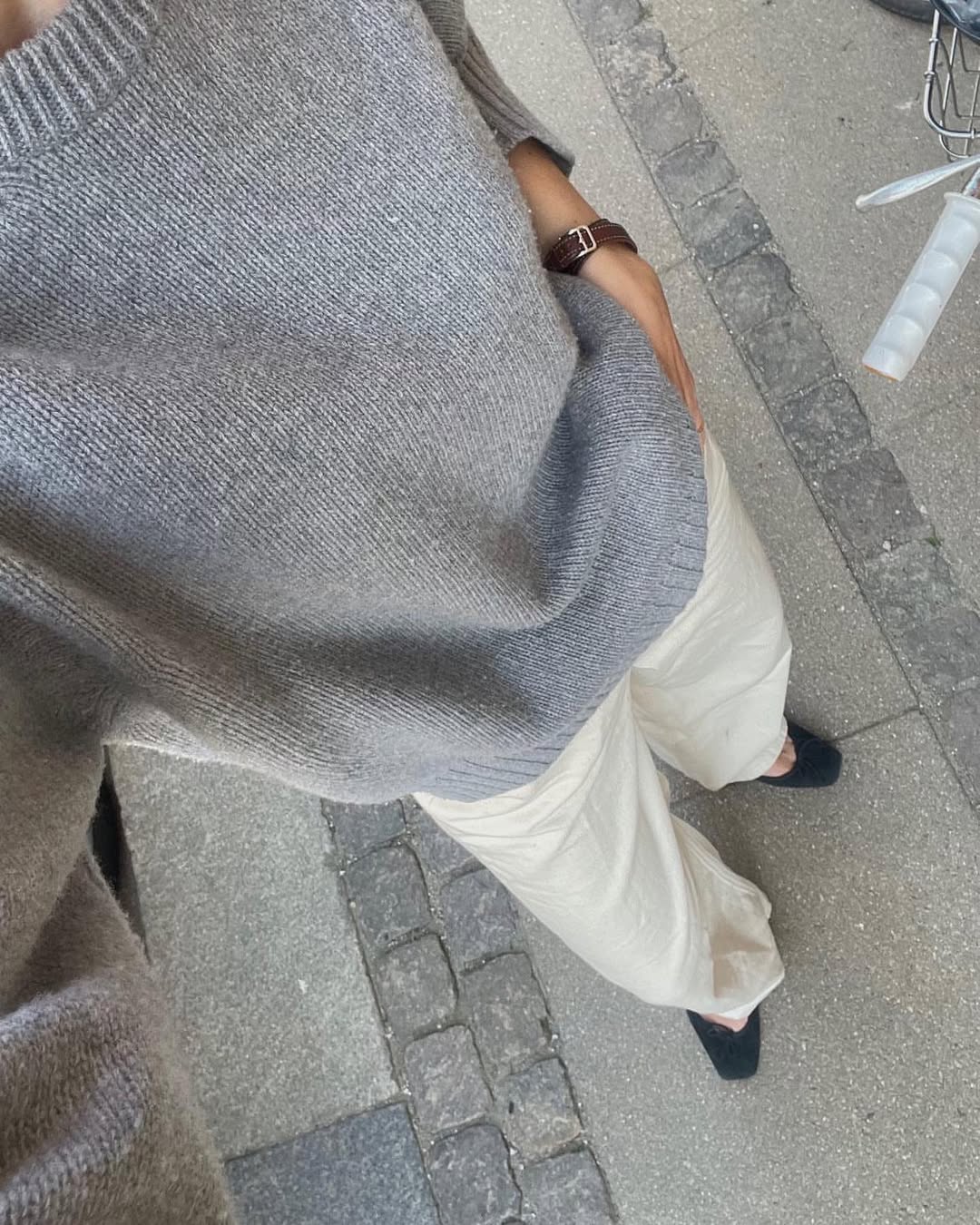 woman wearing ballet flats with white pants summer 2025