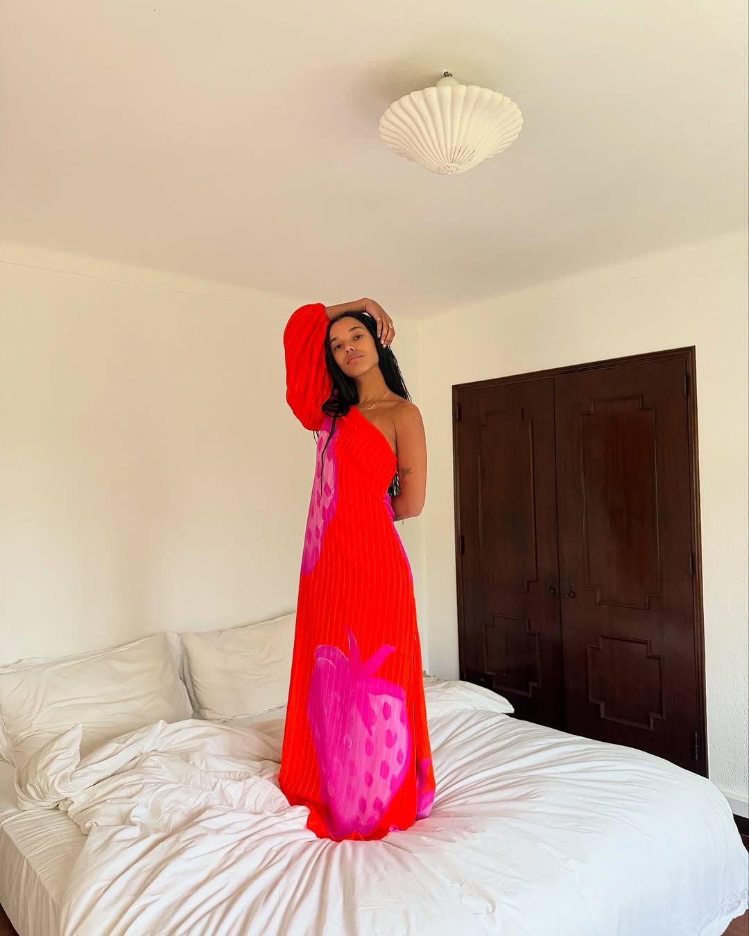 woman wearing pink and red long dress