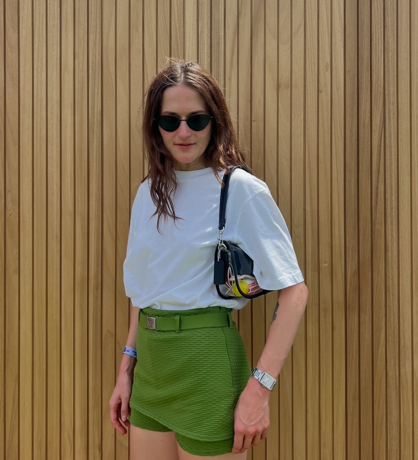 Summer outfit with white T-shirt a green Prada skort