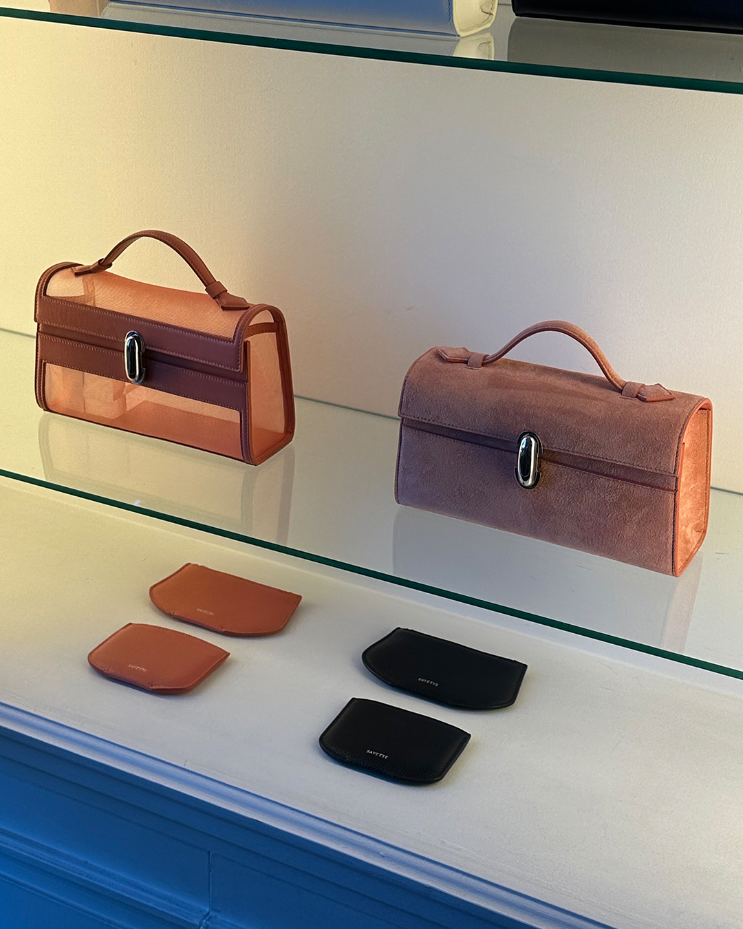 Savette bags on a shelf.