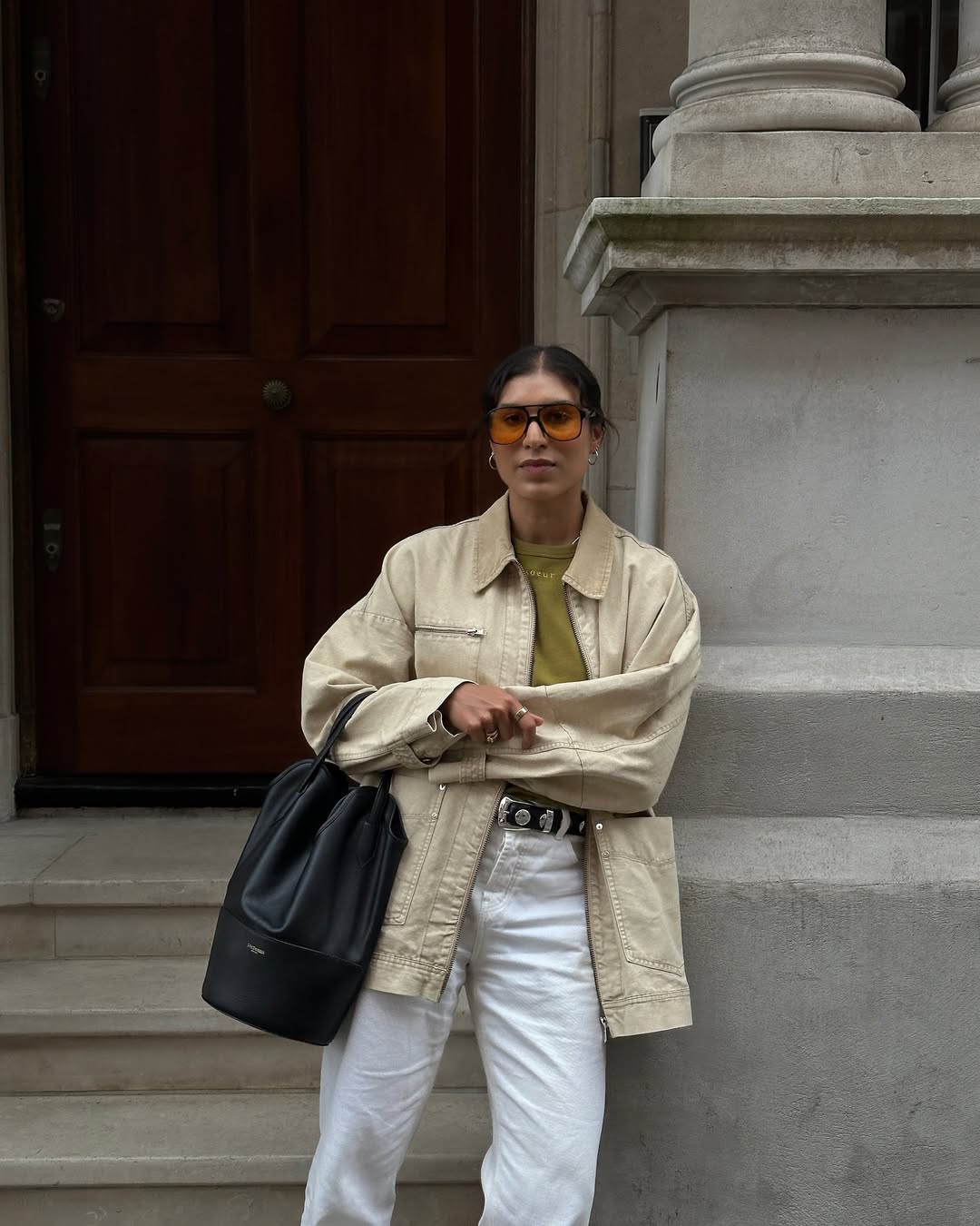 @theindiaedit wearing tinted-lens sunglasses in east London