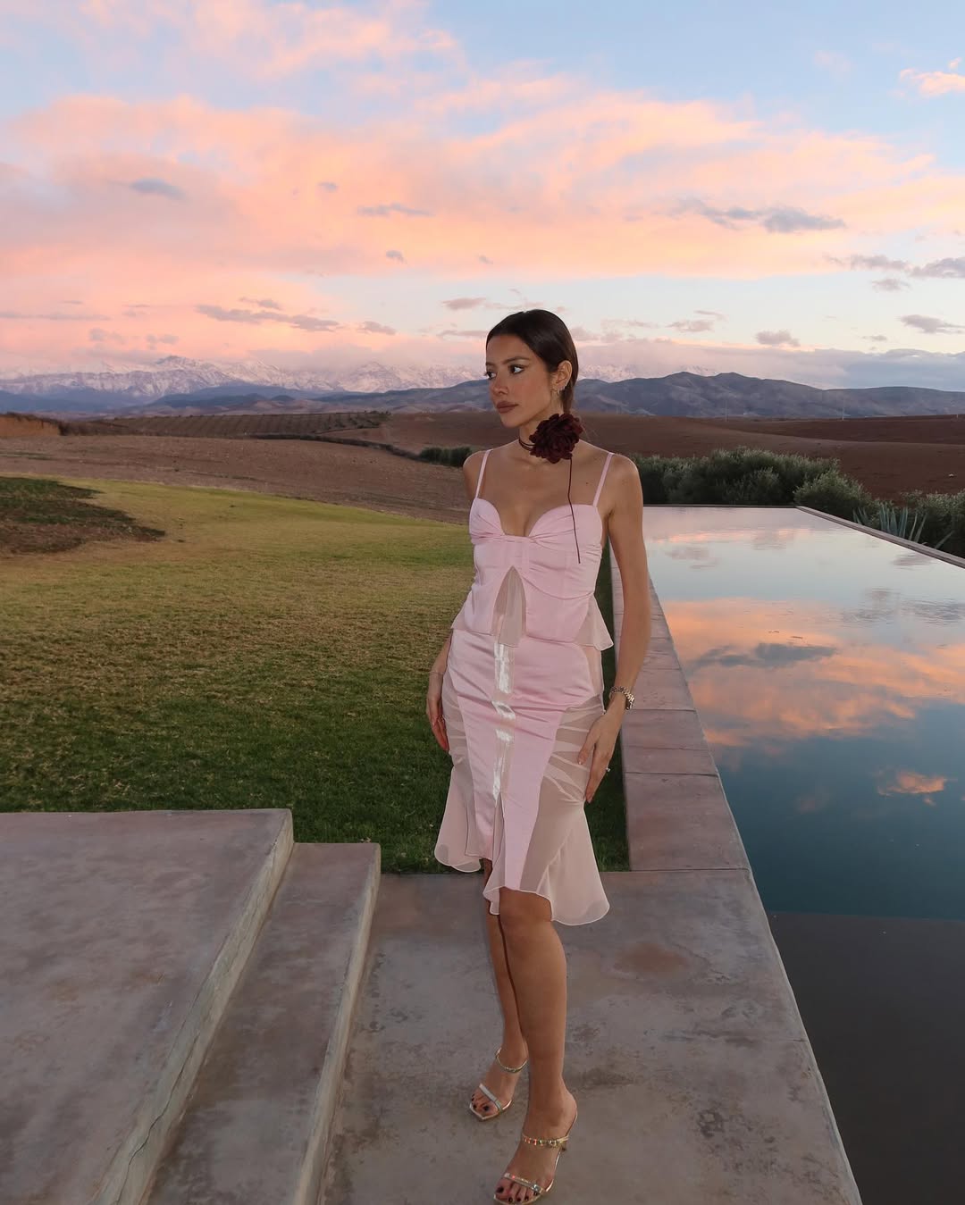 woman wearing matching pink sheer set