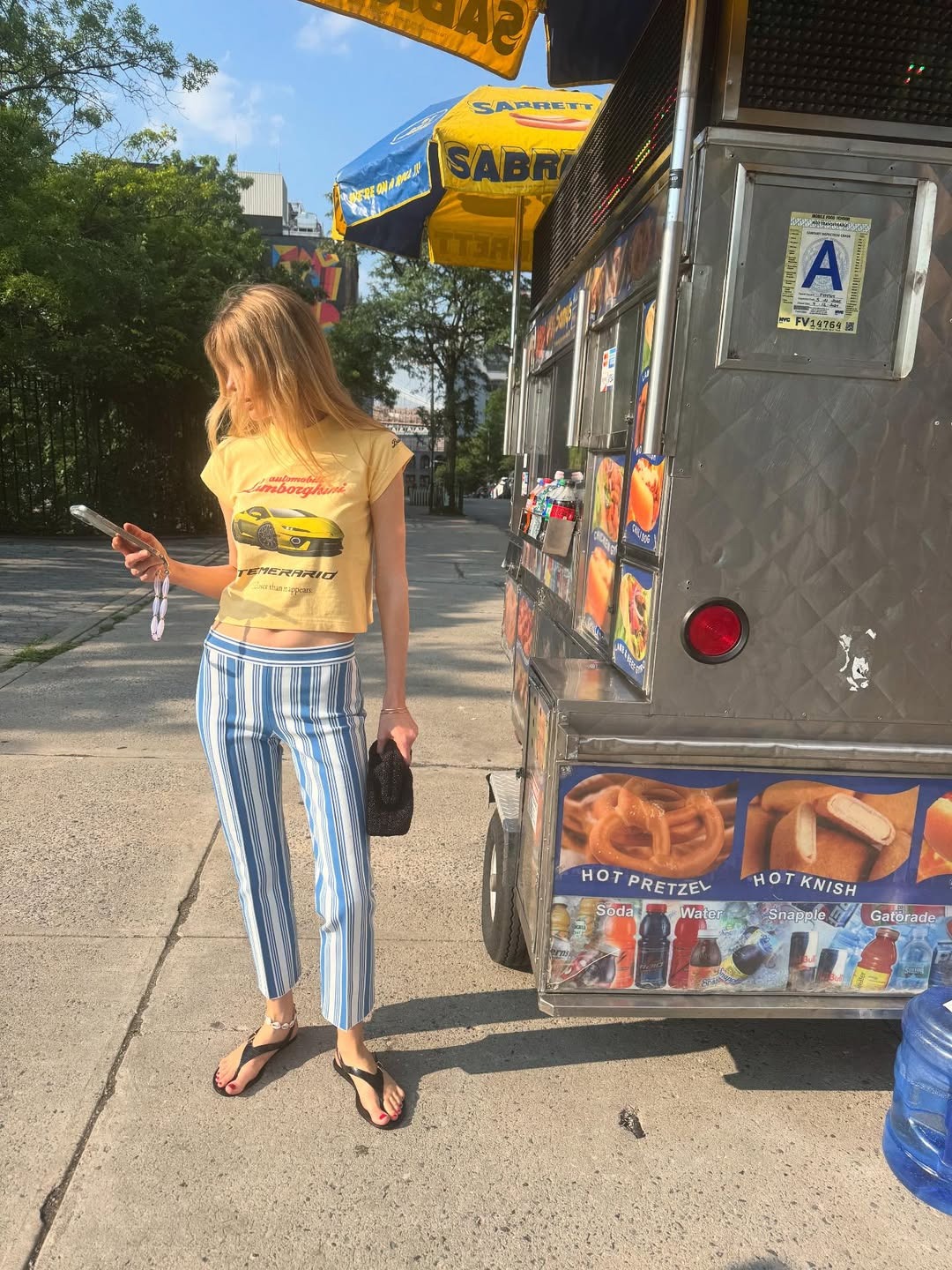 Woman wearing striped High Sport pants.