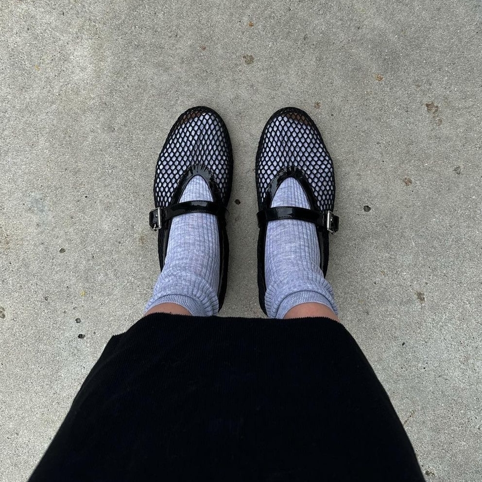 close-up shot of mesh flats with socks