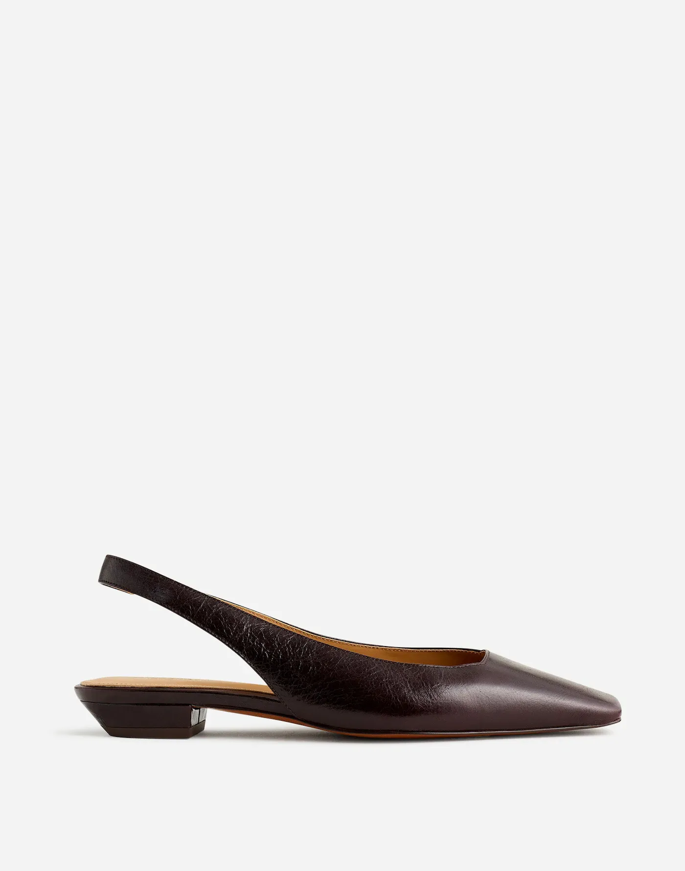 A brown leather slingback square toe flat