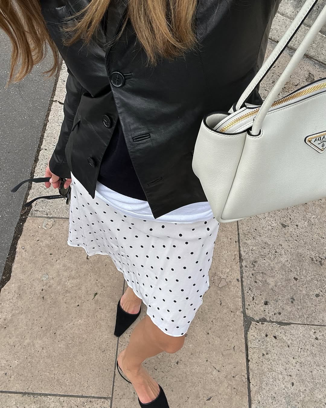 woman wearing polka dots early fall 2025 fashion trends