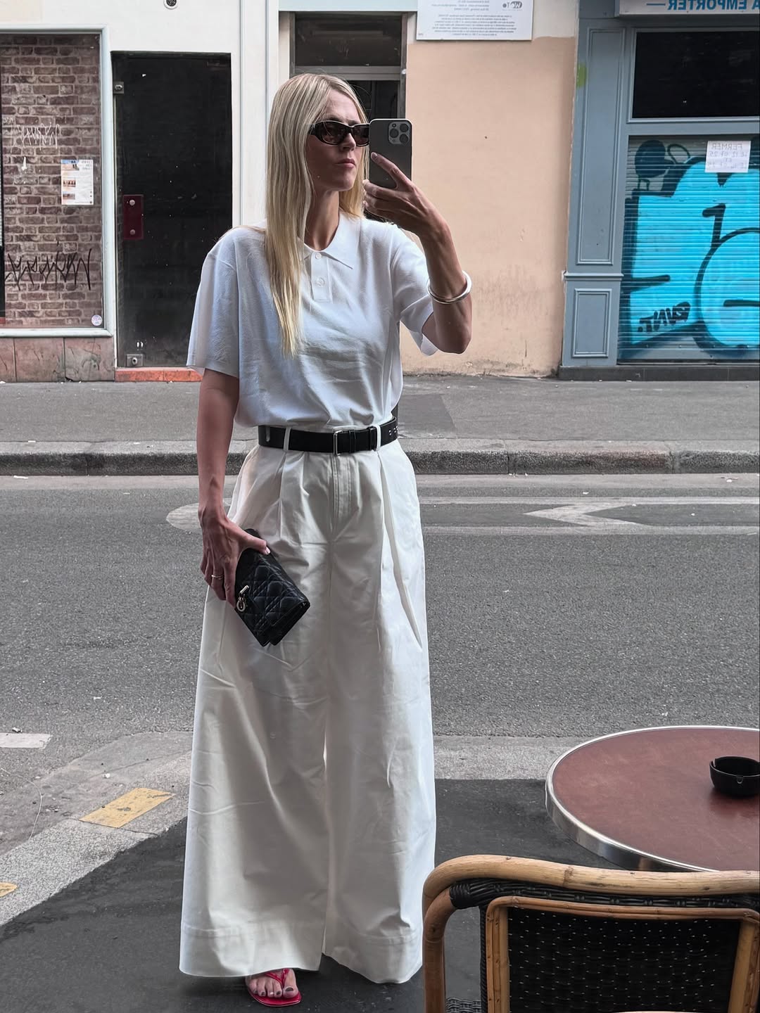woman wearing white trousers black belt fall outfits 2025