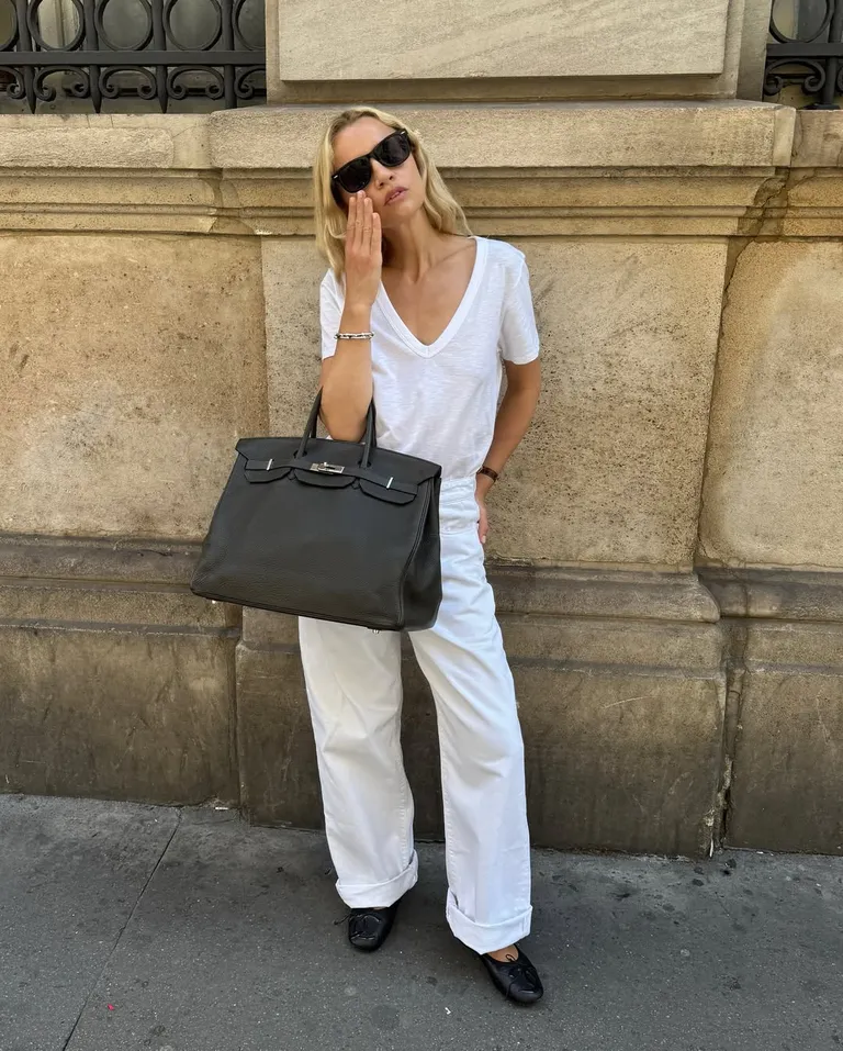 Woman wearing a v-neck tee.