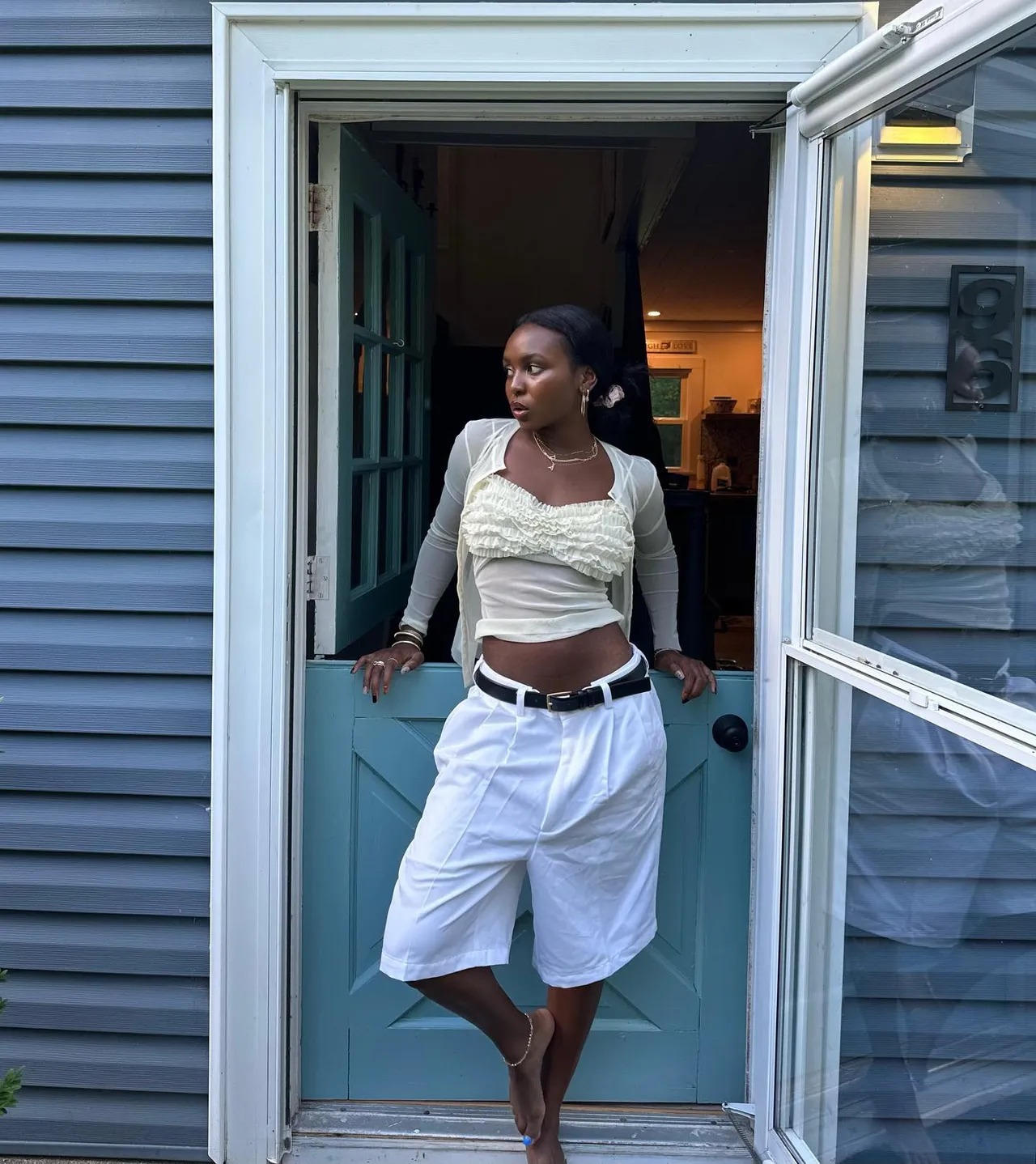 a woman wears linen shorts