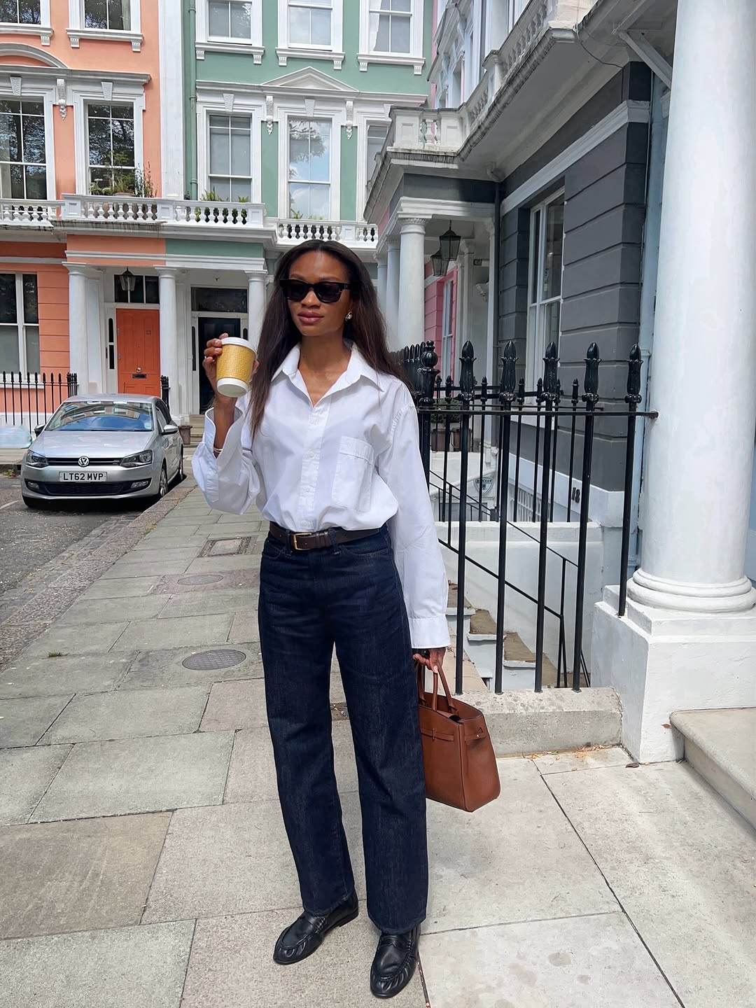 woman wearing fall loafer outfit idea 2025