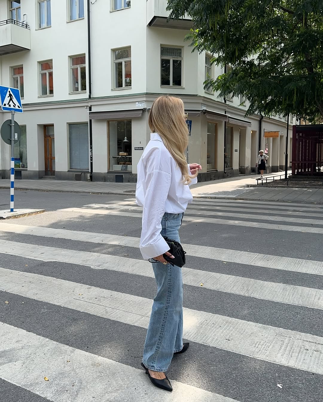 woman wearing chic denim outfit fall 2025
