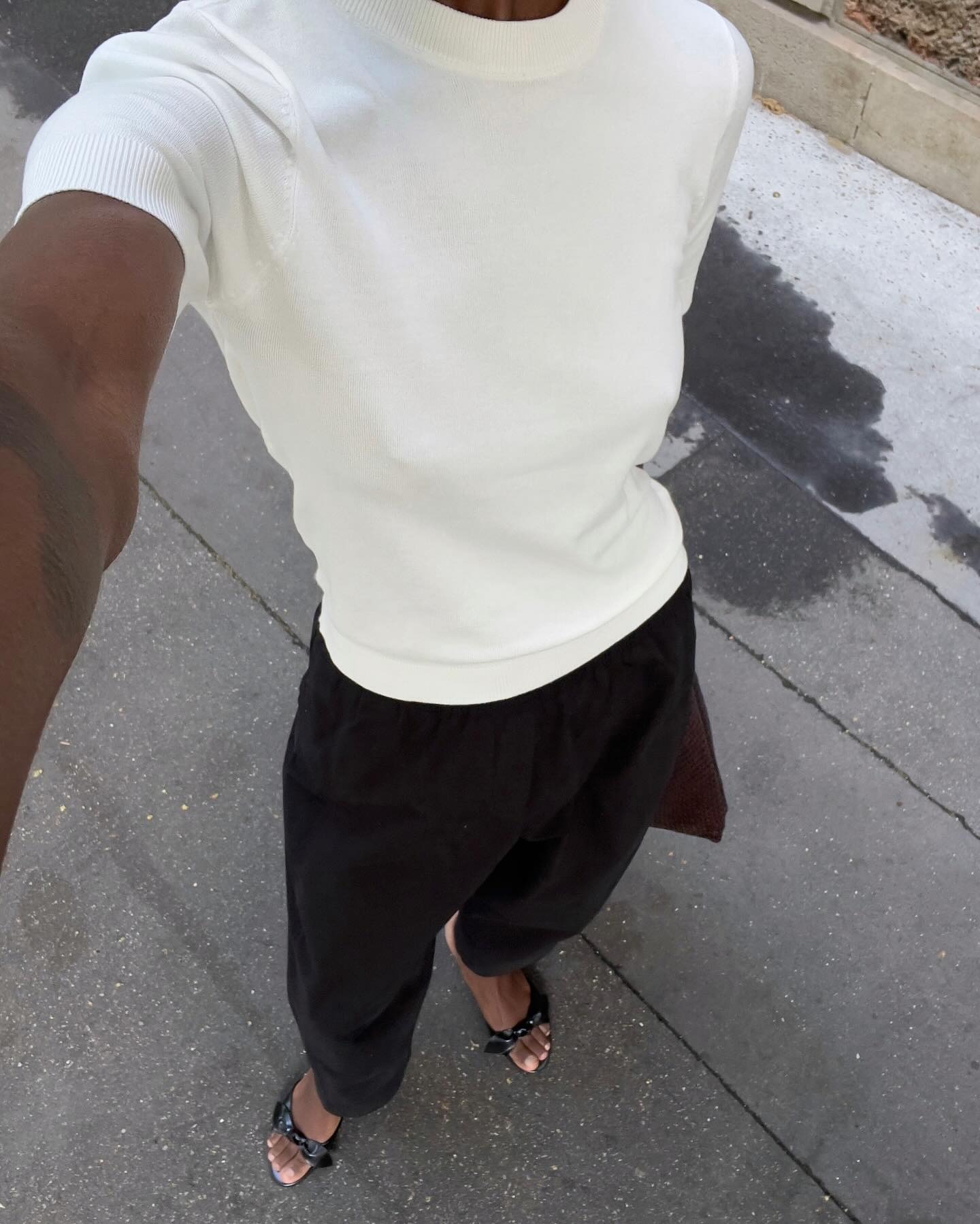 A French woman in a short-sleeve knit