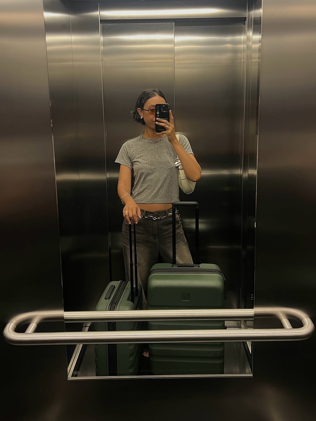 Woman wearing chic airport outfit 2025.