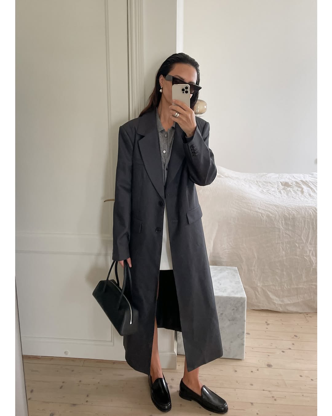 woman wearing fall loafer outfit idea 2025