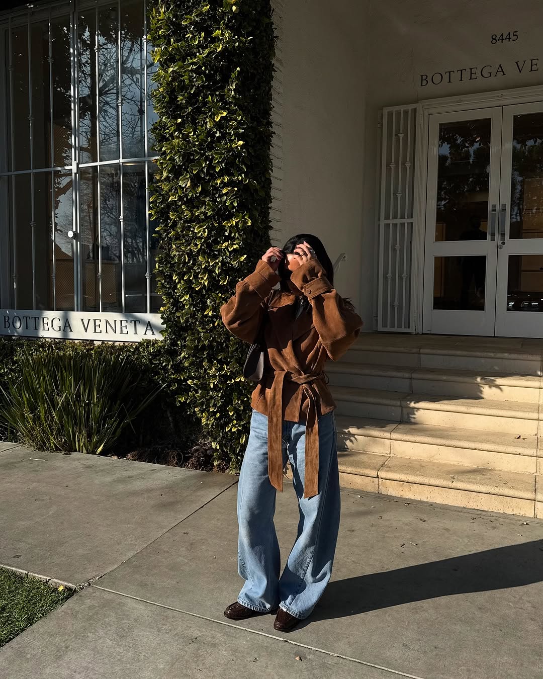 woman wearing fall loafer outfit idea 2025