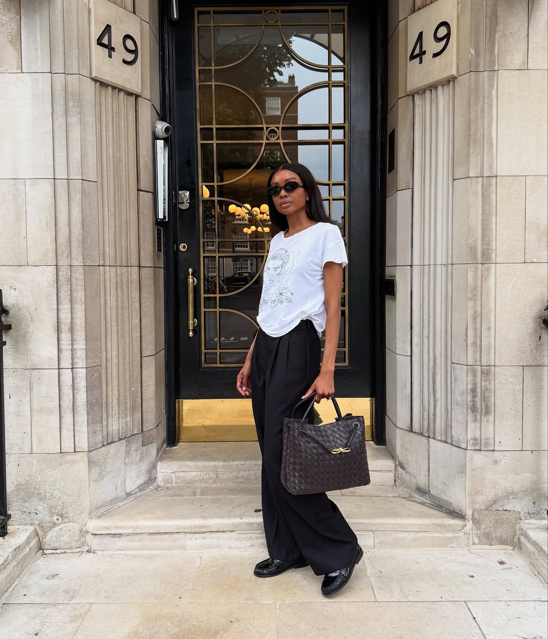 woman wearing fall loafer outfit idea 2025