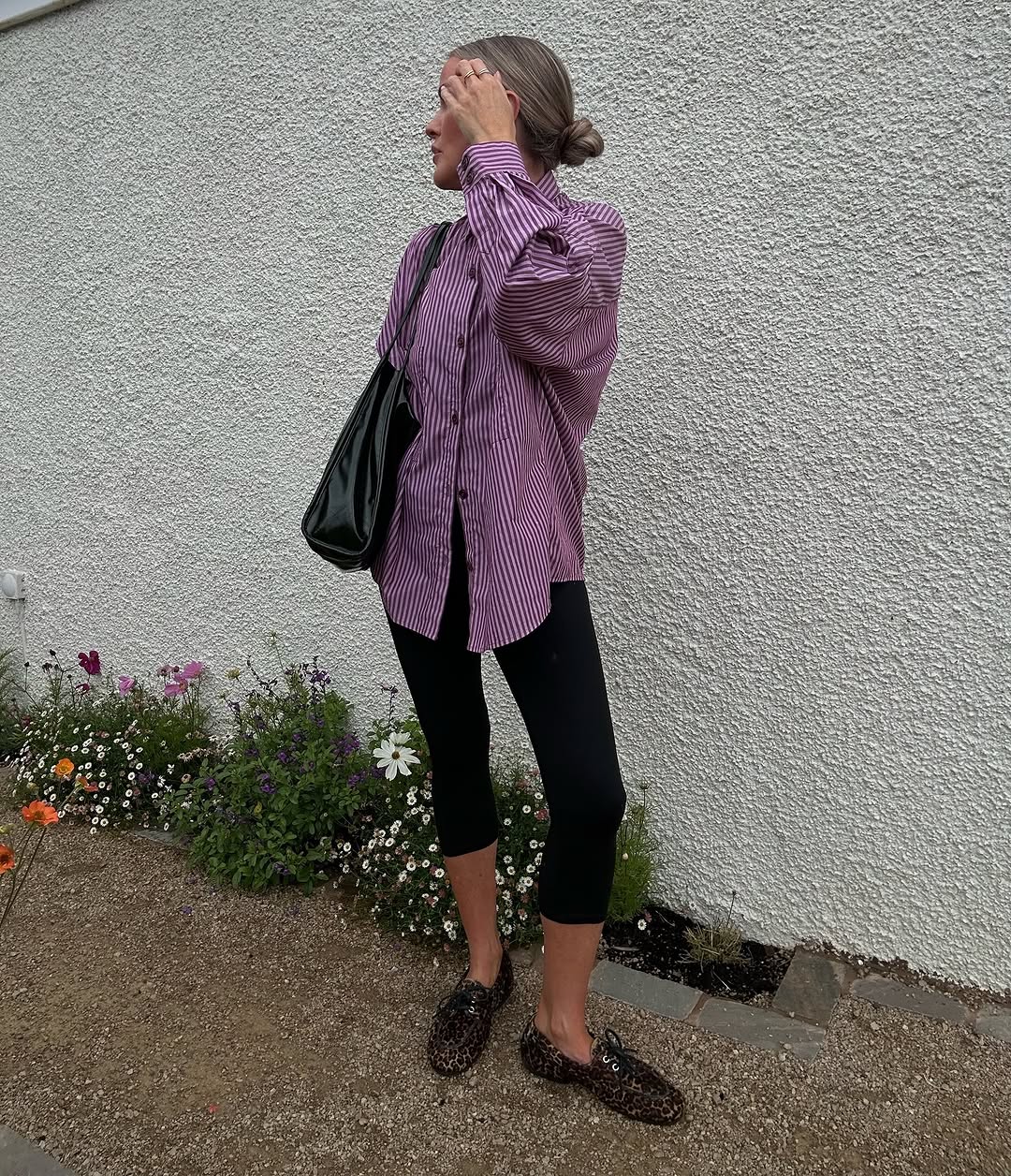 woman wearing fall loafer outfit idea 2025