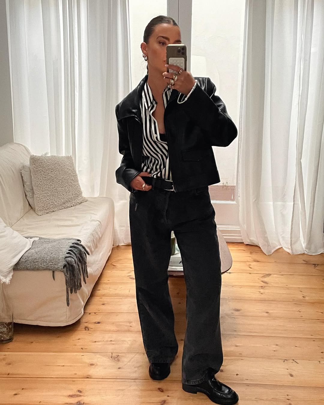 woman wearing fall loafer outfit idea 2025