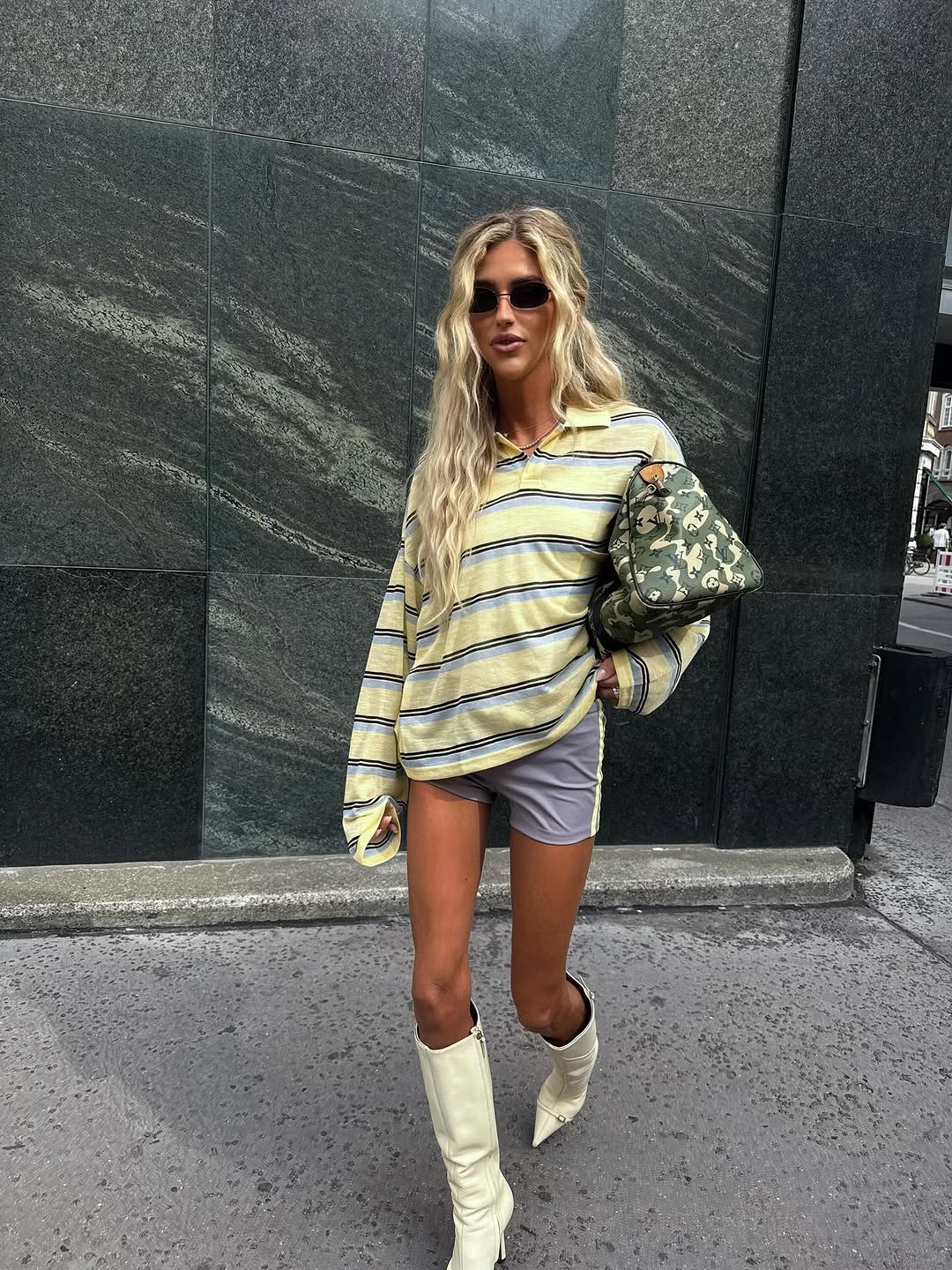 woman wearing striped polo top outfit