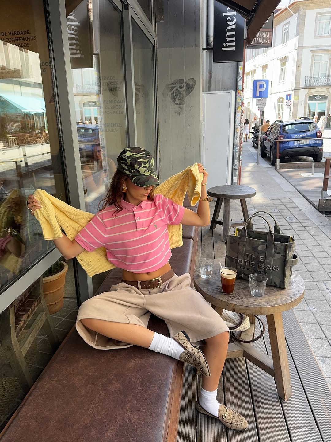 woman wearing striped polo top outfit