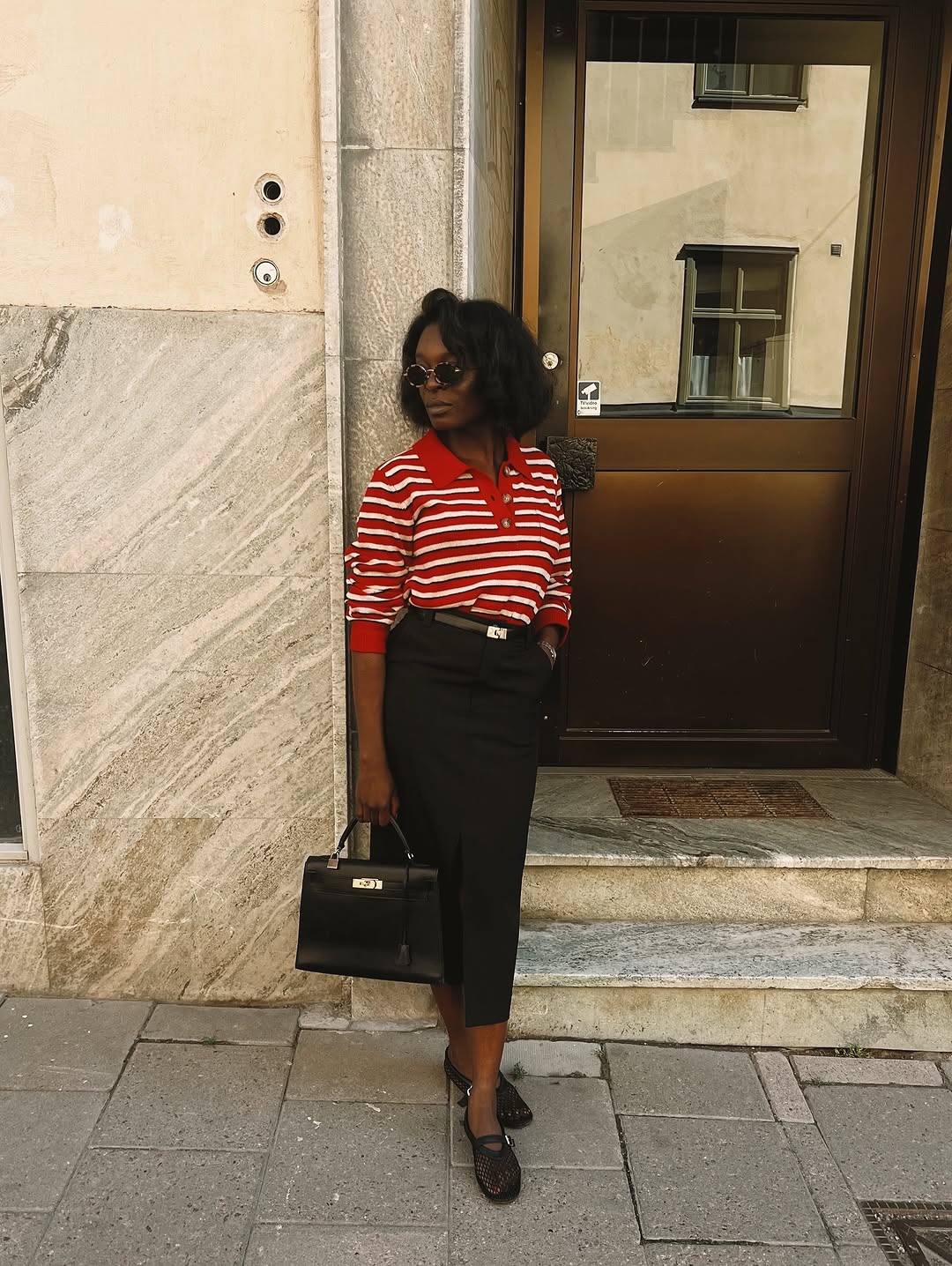woman wearing striped polo top outfit