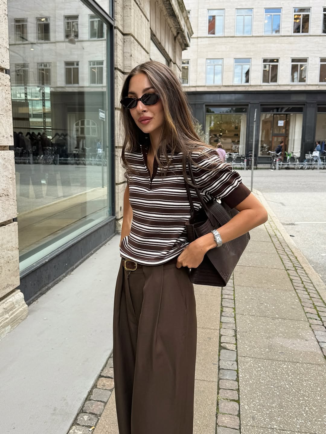 woman wearing striped polo top outfit