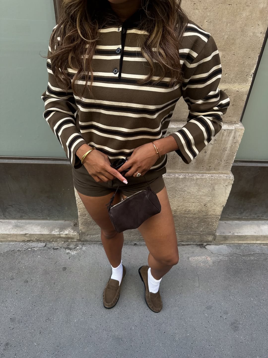 woman wearing striped polo top outfit