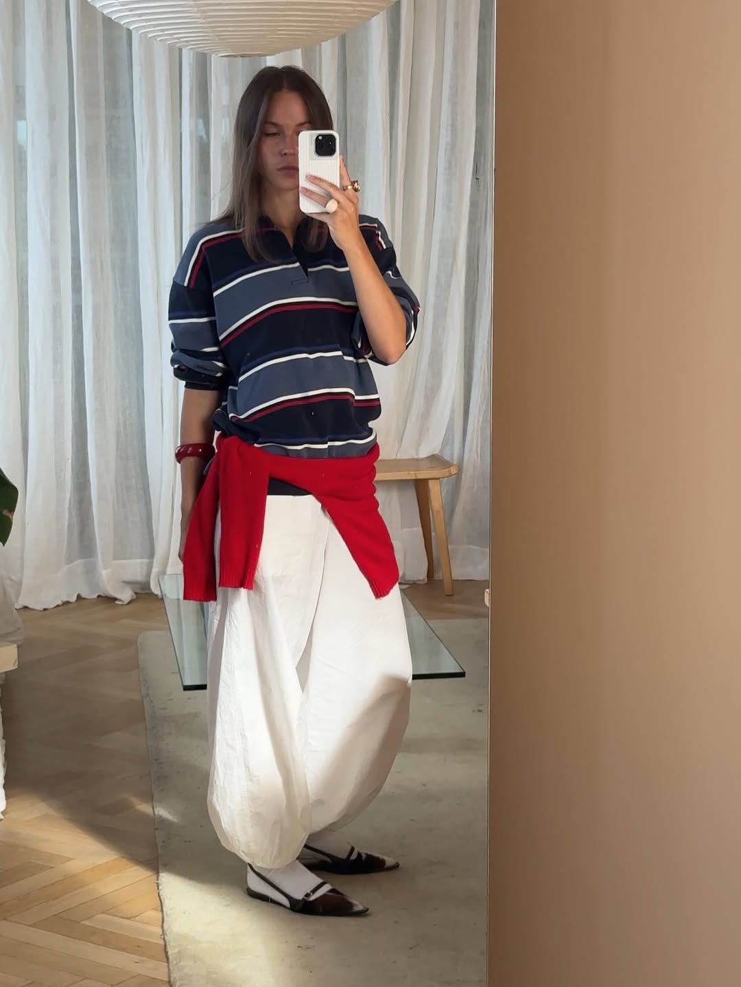 woman wearing striped polo top outfit