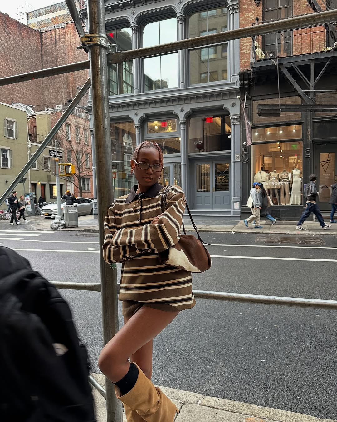 woman wearing striped polo top outfit