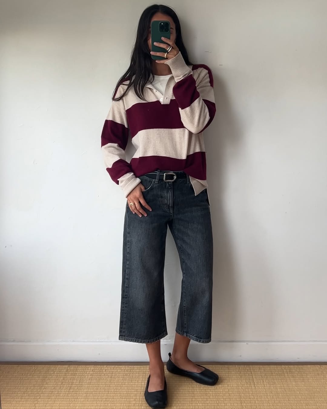 woman wearing striped polo top outfit