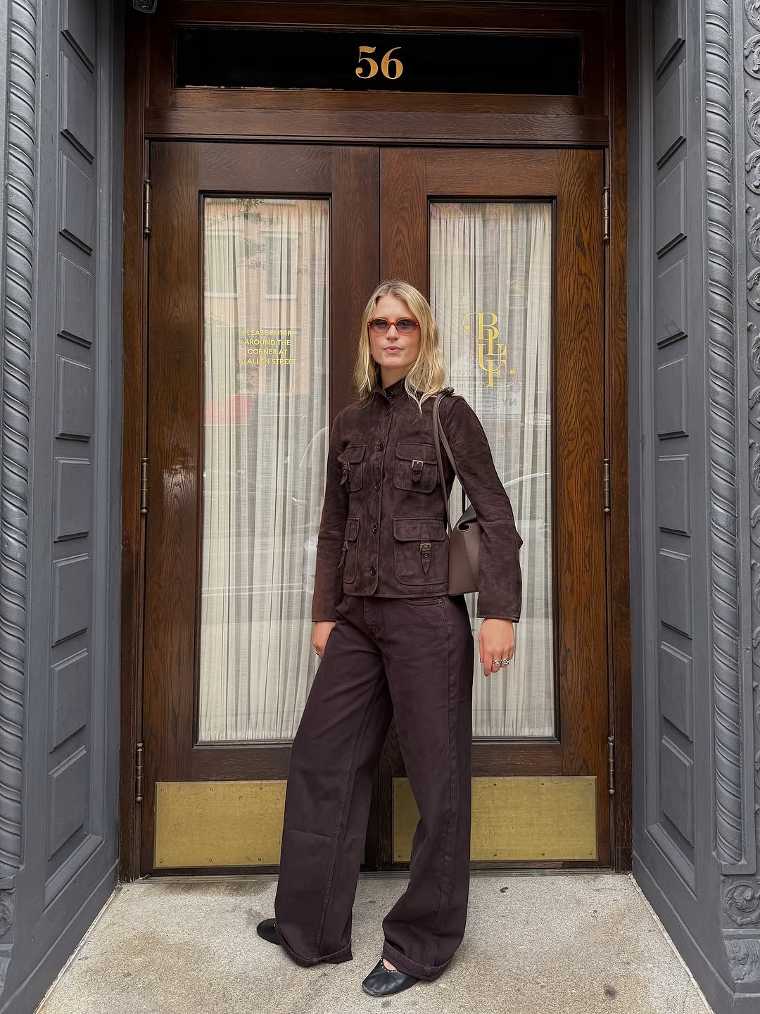 woman wearing fall ballet flats outfit 2025