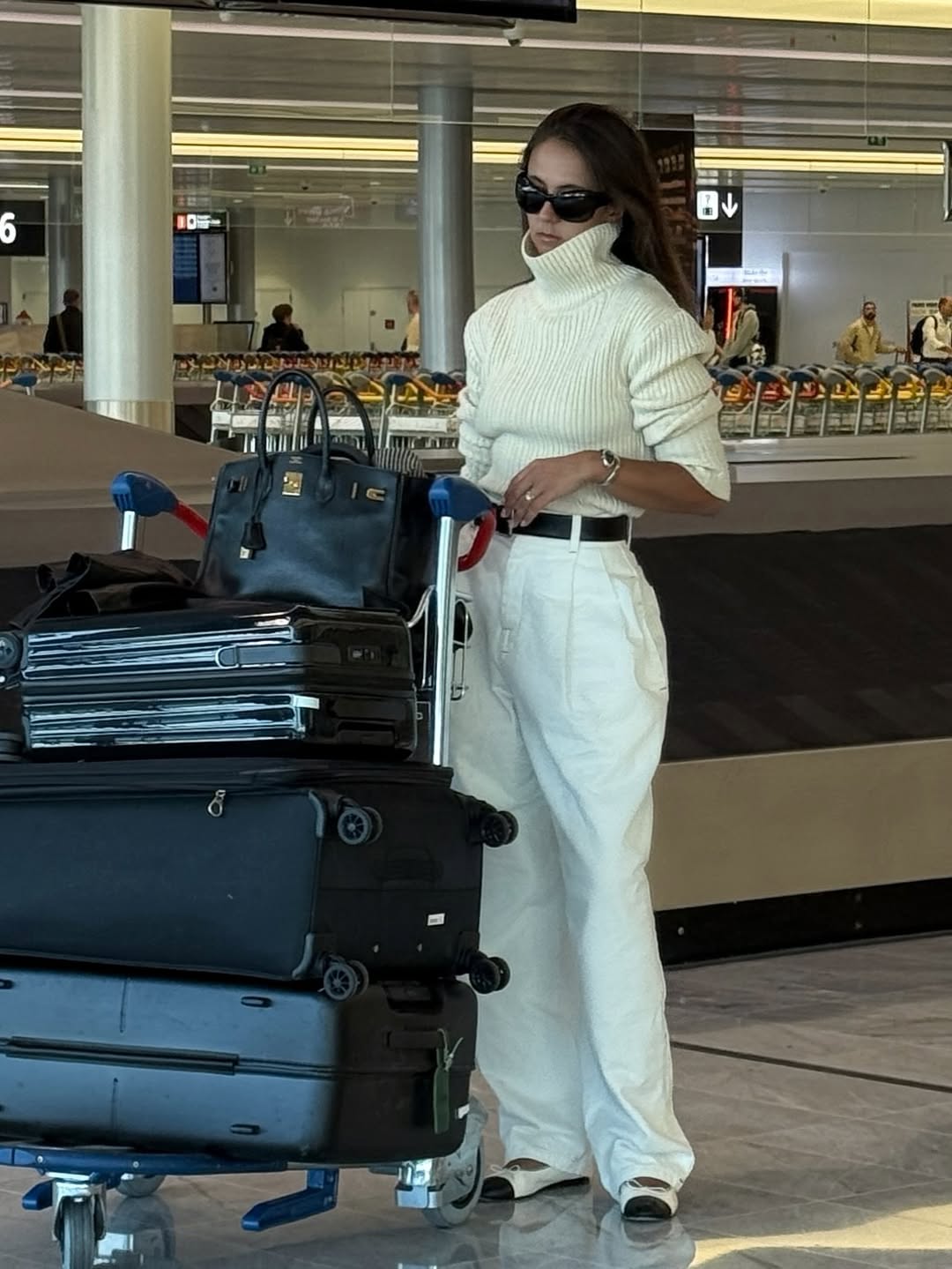 Hanna MW wearing an all-white outfit