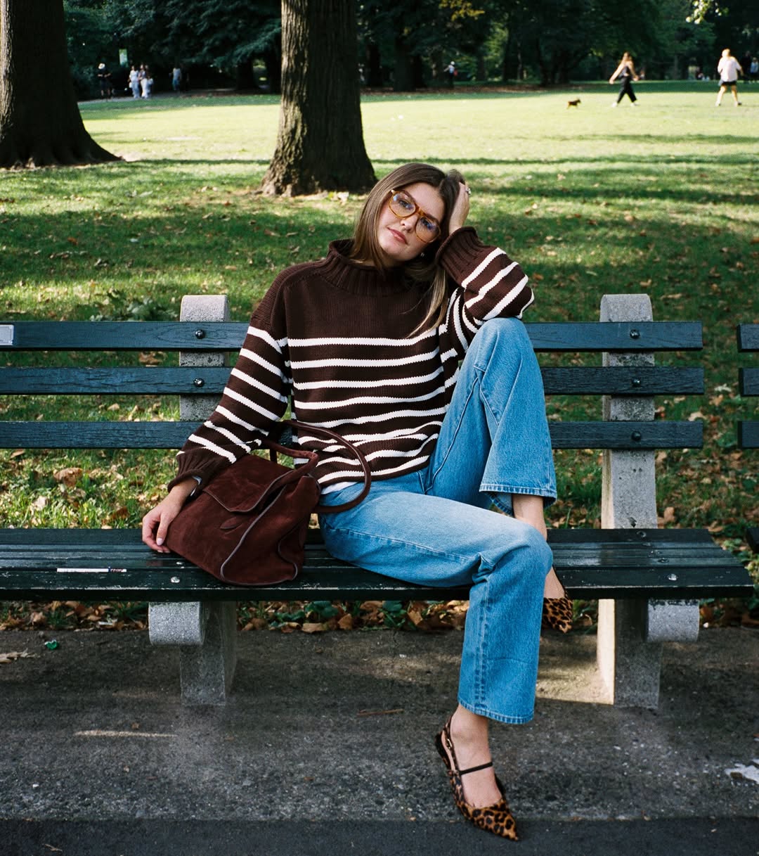 Sara in a striped sweater.