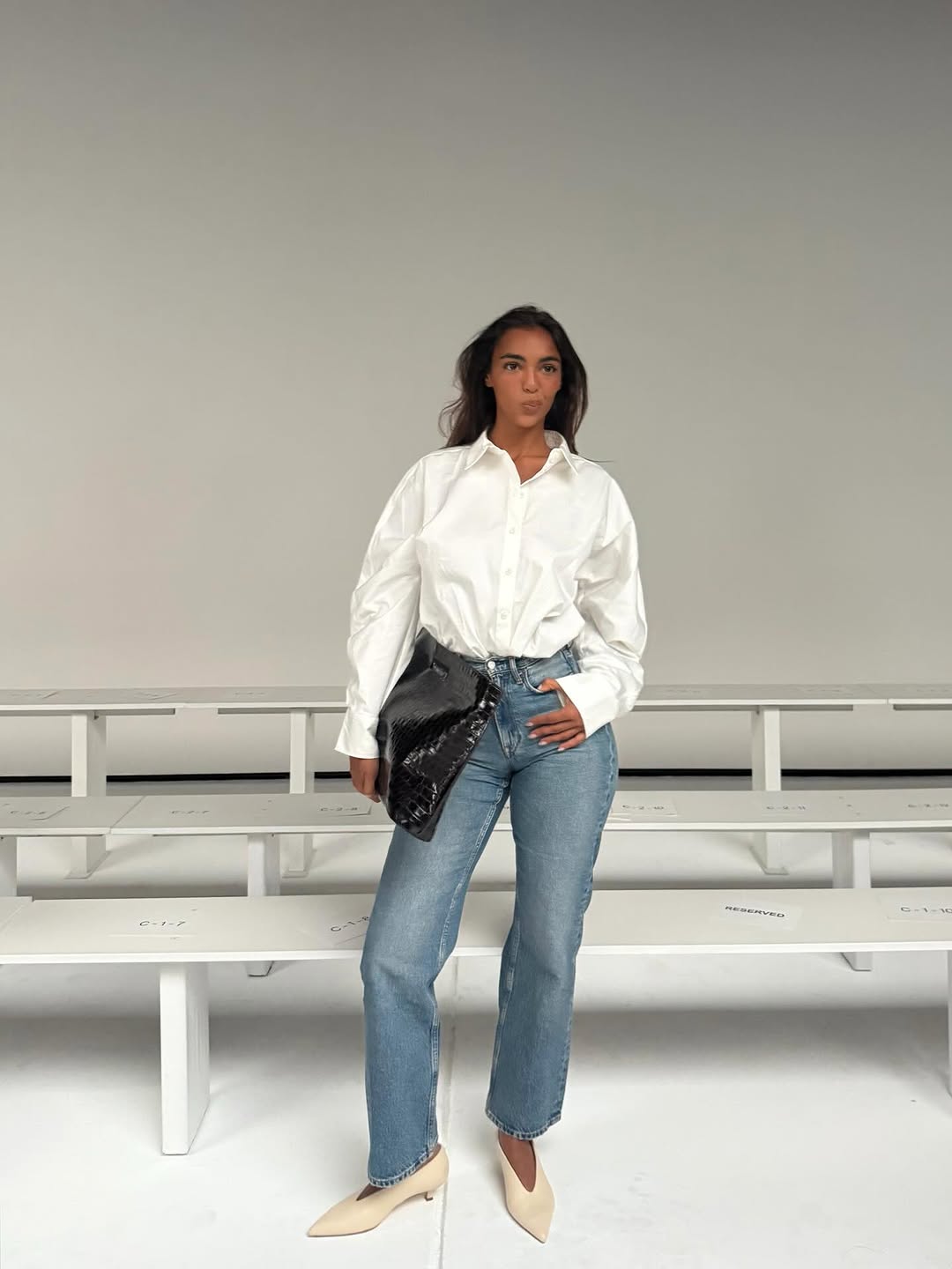 woman wearing fall denim trend 2025