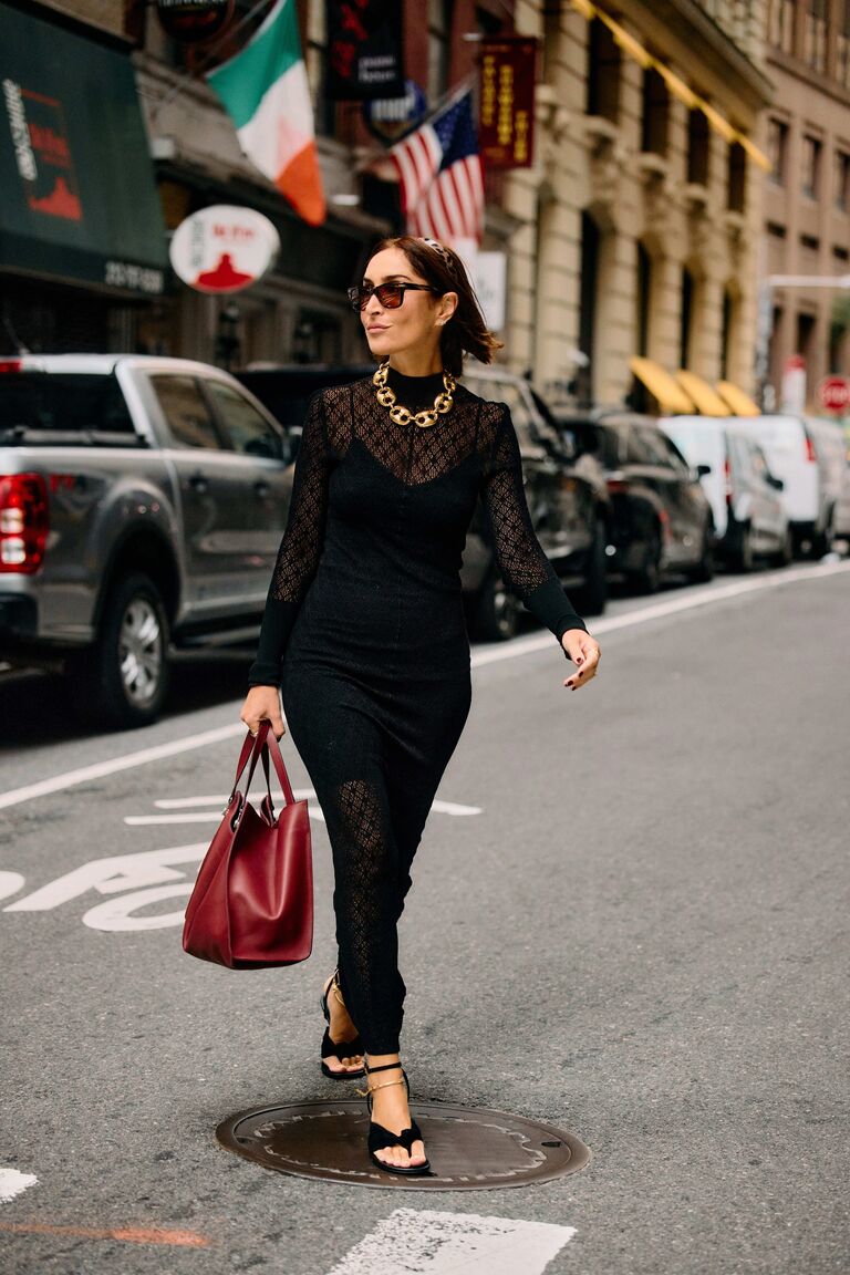 Woman wearing lace clothing during NYFW S/S 26.