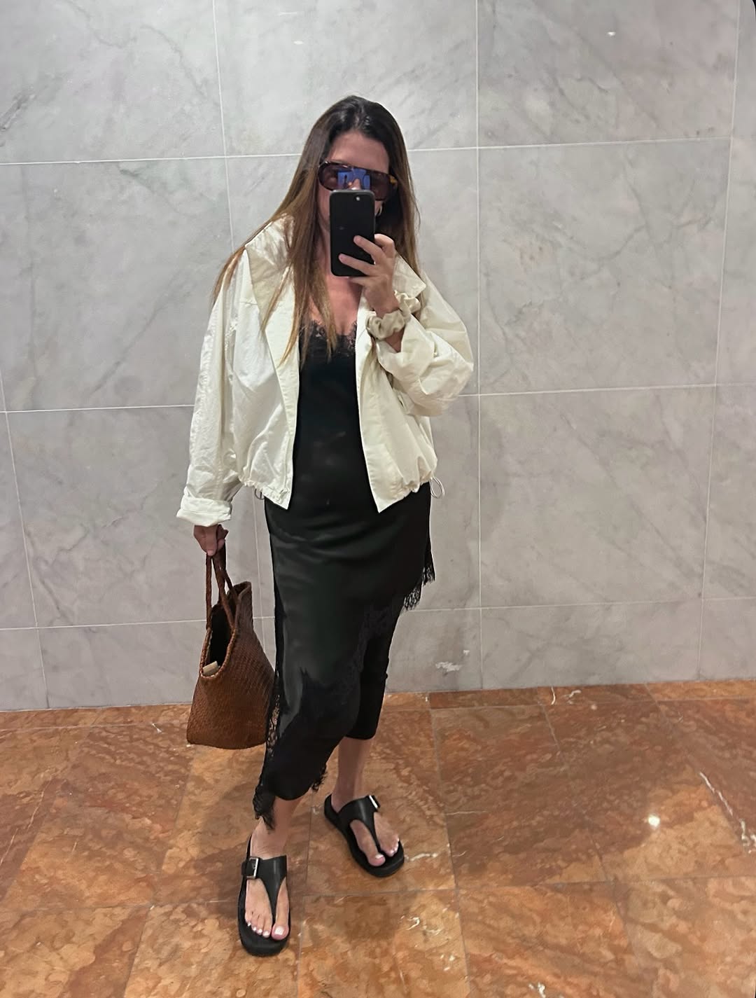 Woman wearing black lace going out top.