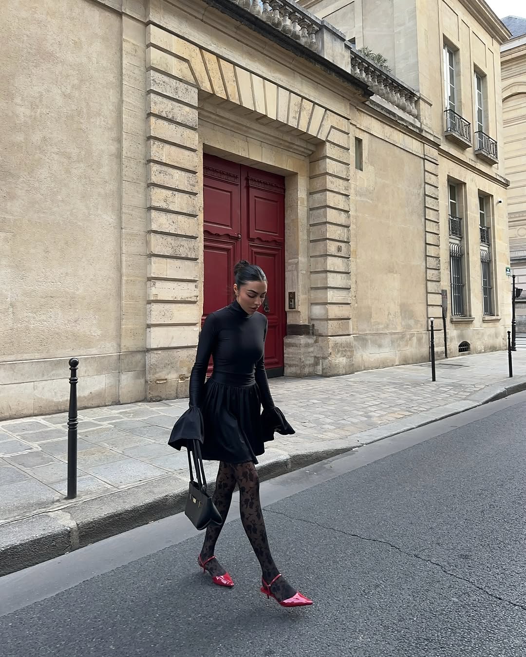 Woman wearing burgundy shoe outfit 2025.