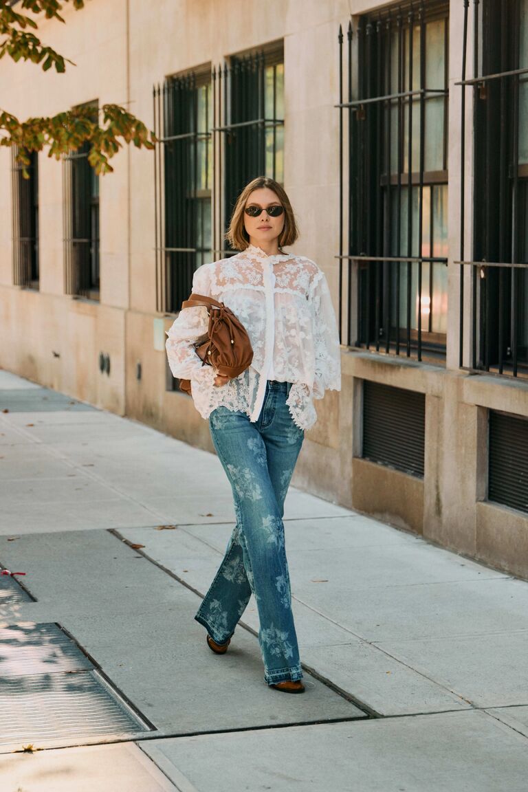 Woman wearing lace clothing during NYFW S/S 26.