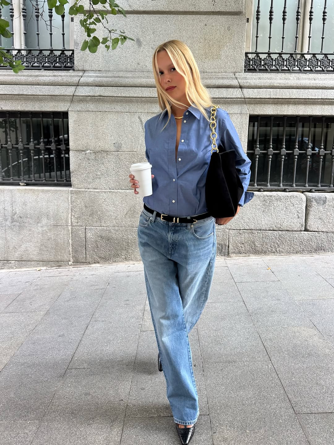woman wearing jeans with leather belt fall 2025