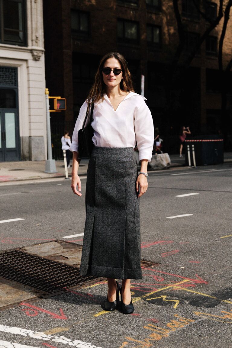 Woman wearing a column skirt during NYFW S/S 26.
