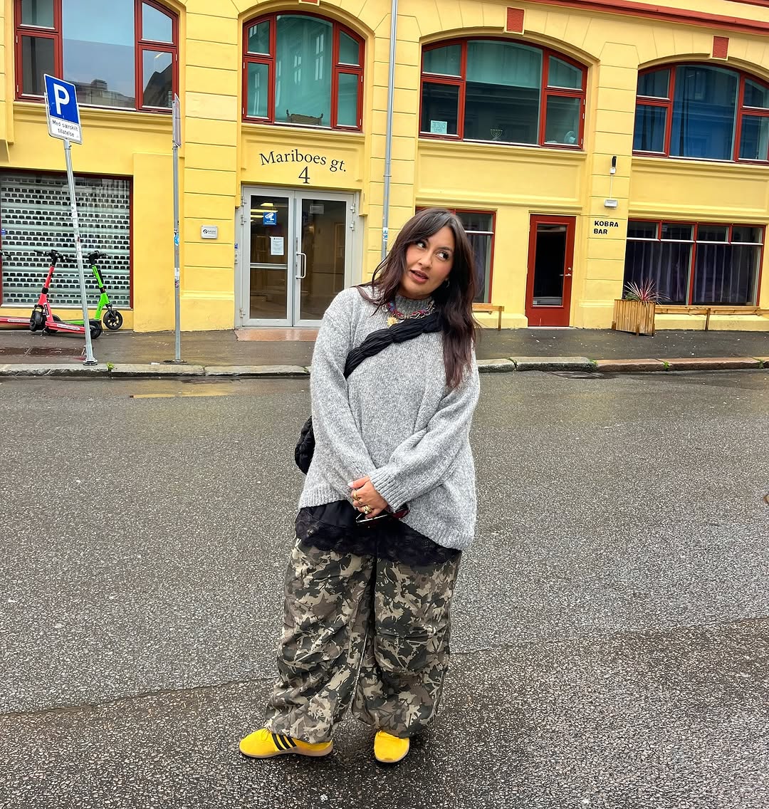 Woman wearing black lace going out top.