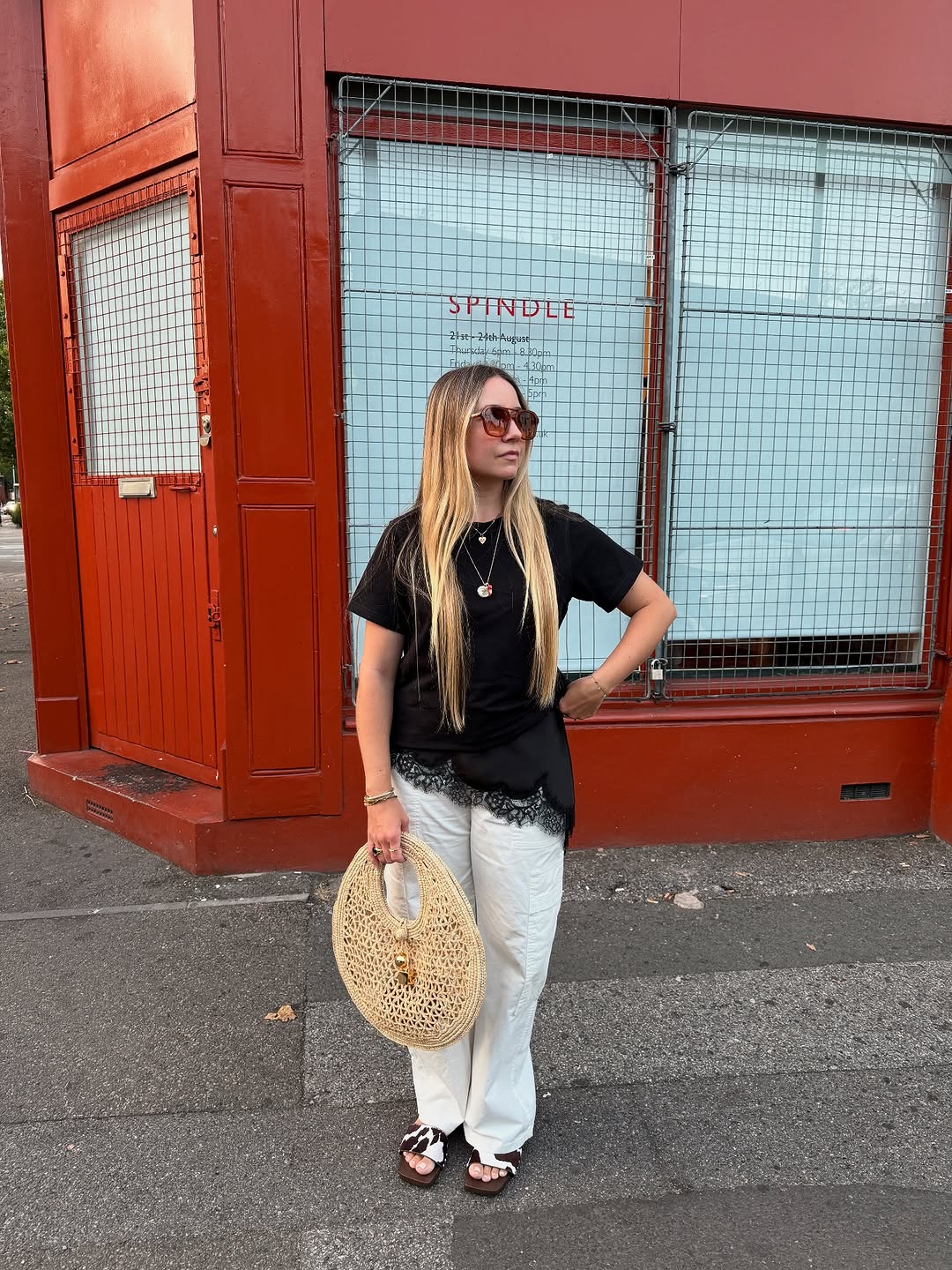Woman wearing black lace going out top.