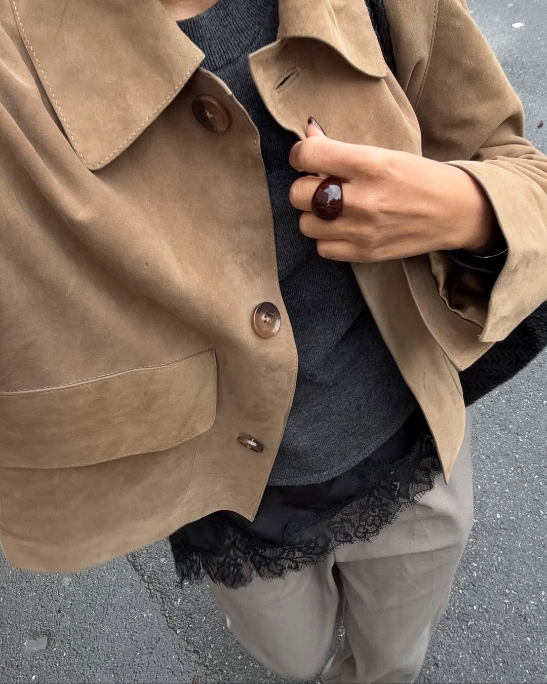 Woman wearing black lace going out top.